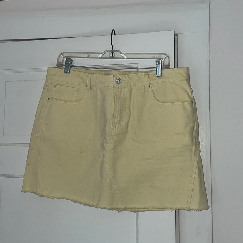 Yellow denim mini skirt